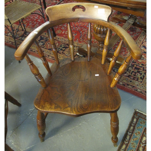 522 - Early 20th Century elm smokers bow chair.
(B.P. 21% + VAT)