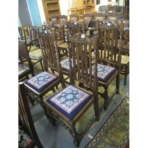 529 - Set of four oak barley twist and slat back dining chairs with stuff over tapestry seats. (4)
(B.P. 2... 