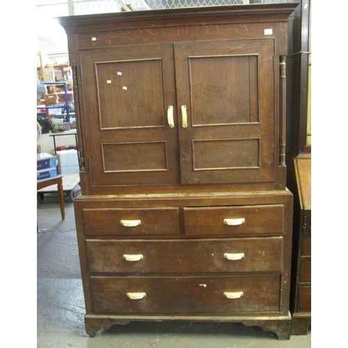 533 - Early 19th Century Welsh oak two stage linen press cupboard with associate plastic handles. 
(B.P. 2... 