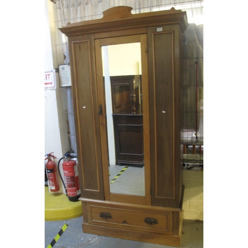 534 - Early 20th Century pine single door mirrored wardrobe. 
(B.P. 21% + VAT)