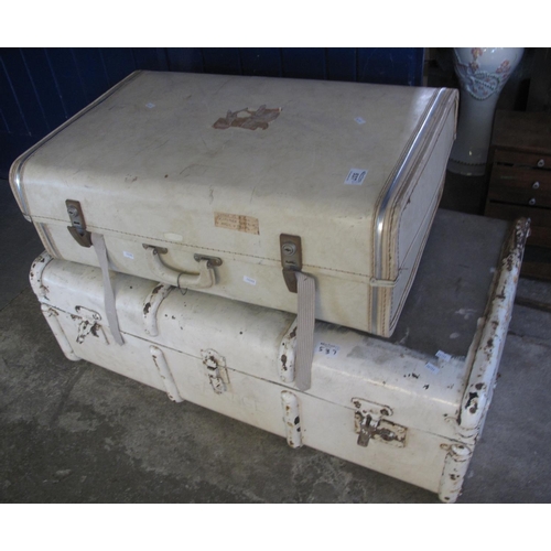 537 - A vintage metal banded trunk, together with a cream suitcase. 
(B.P. 21% + VAT)