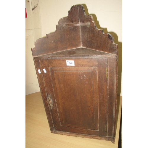 549 - 19th Century Welsh oak blind panelled hanging corner cupboard. 
(B.P. 21% + VAT)