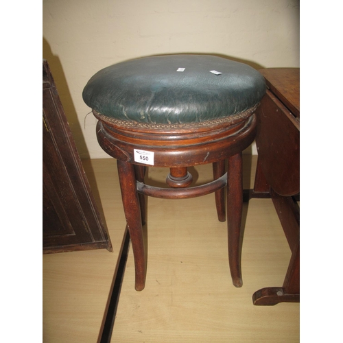 550 - Victorian mahogany swivel stool with leather top.
(B.P. 21% + VAT)