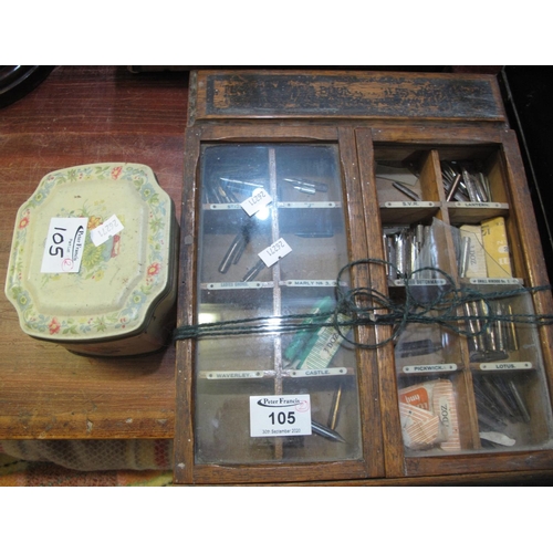 105 - A vintage shop miniature cabinet for the sale of pen knibs - indistinctly marked, with a tin of old ... 