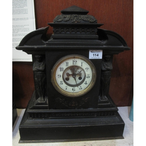 114 - Late 19th century black slate architectural mantel clock having exposed escapement to the two-train ... 