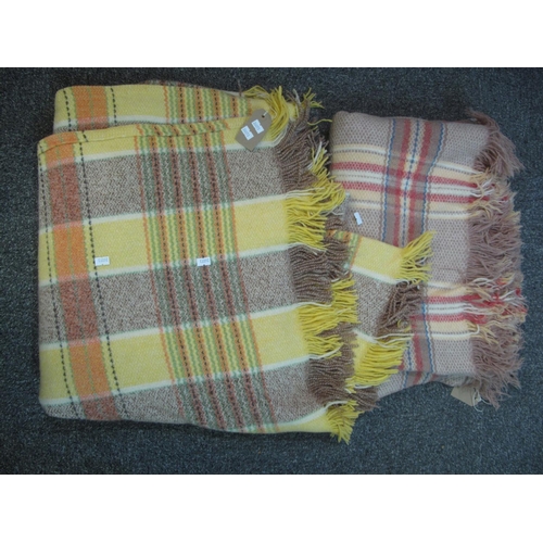 119 - Two Welsh woollen tartan blankets. (2)
(B.P. 21% + VAT)