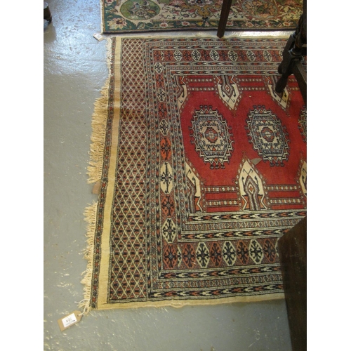 504 - Modern red ground Middle Eastern deign rug decorated with central gulls. 131 x 185 cm approx.
(B.P. ... 