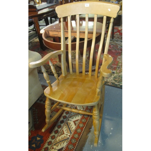 511 - Traditional beech slat backed kitchen rocking elbow chair.
(B.P. 21% + VAT)