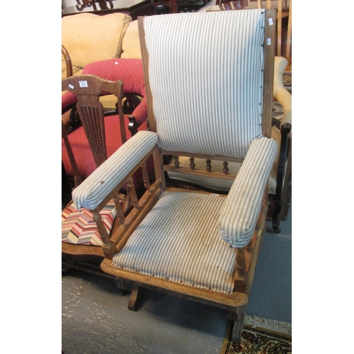 513 - Late 19th/early 20th century American rocking chair with padded upholstery.
(B.P. 21% + VAT)