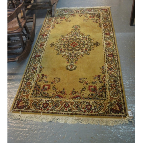 516 - Small Indian mustard ground foliate rug. 90 x 165 cm approx.
(B.P. 21% + VAT)