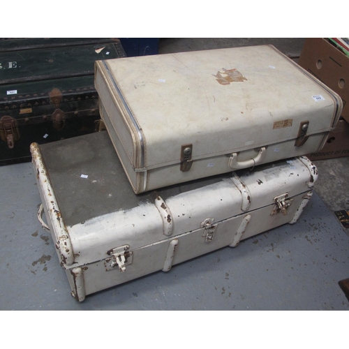 522 - A vintage metal banded trunk, together with a cream suitcase. 
(B.P. 21% + VAT)