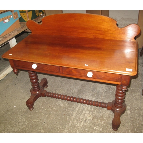 542 - Victorian mahogany dressing table with shaped back and bobbin stretcher, two drawers.
(B.P. 24% incl... 