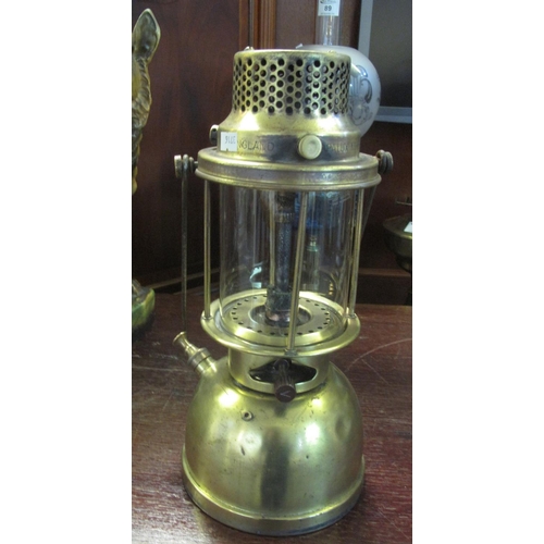 91 - A Palux model 300 brass storm lantern, primers type pressure action and spring swing handle. 35 cm h... 