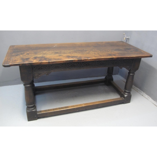 63 - 17TH CENTURY STYLE OAK REFECTORY TABLE having three plank cleated top above arcade frieze decorated ... 