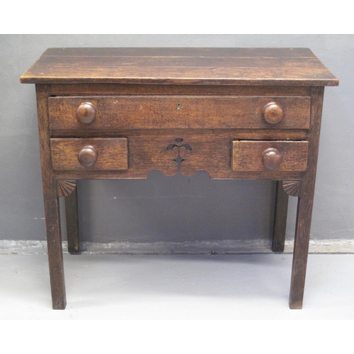 64 - EARLY 19TH CENTURY OAK LOWBOY having moulded top above one long drawer, flanked by two smaller ones ... 