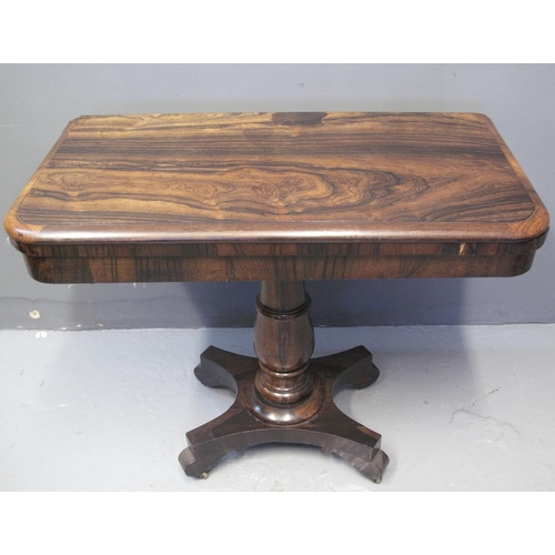 65 - 19TH CENTURY ROSEWOOD TEA TABLE, the moulded top with hinged lid above a gun barrel pedestal standin... 