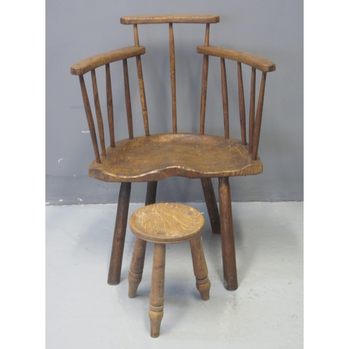 75 - SMALL PRIMITIVE BEECH, ASH AND ELM STICK BACKED CHILD'S CHAIR with raised comb, moulded seat on four... 