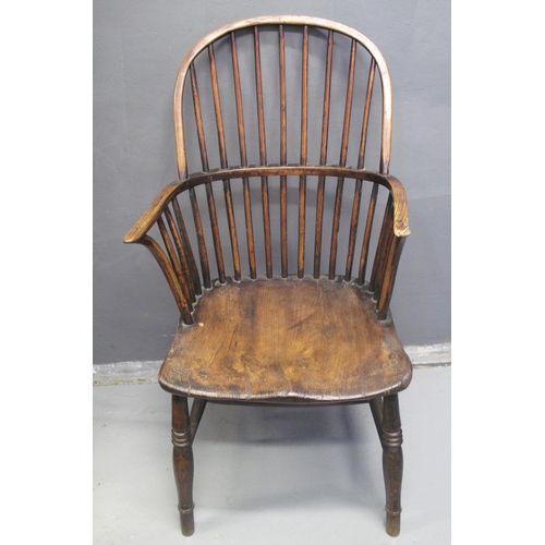 81 - 19TH CENTURY ASH AND ELM WINDSOR ARMCHAIR having moulded seat, standing on turned supports and stret... 