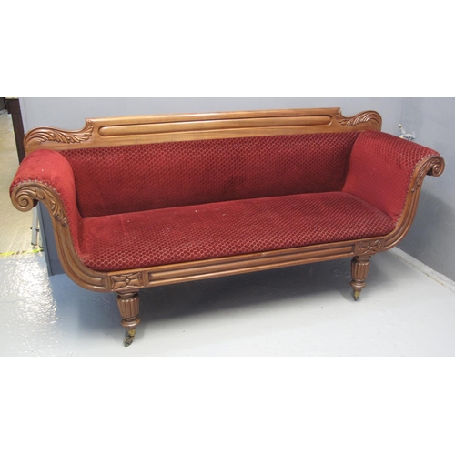 86 - VICTORIAN MAHOGANY DOUBLE ENDED SOFA having carved foliate back, the upholstered scroll arms with ca... 