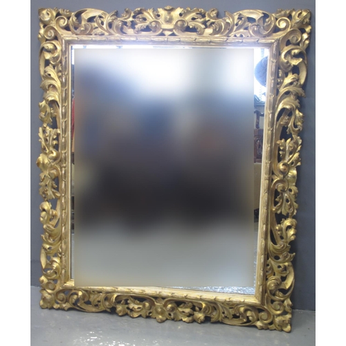 91 - 19TH CENTURY FLORENTINE DESIGN GILDED GESSO MIRROR of rectangular form. 1056 x 122cm approx (includi... 