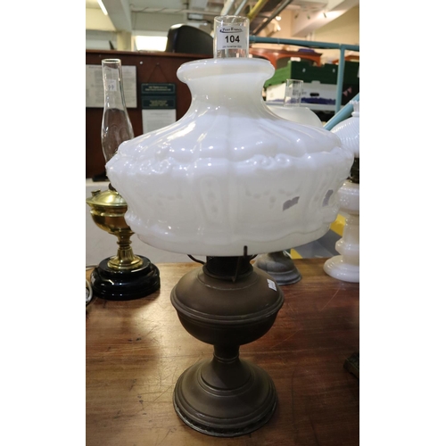 104 - Brass oil lamp with opaque glass shade and clear chimney. 
(B.P. 21% + VAT)