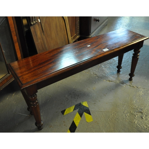 521 - Victorian style mahogany side table of low form on turned legs.
(B.P. 21% + VAT)