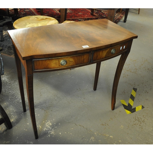 526 - Regency style mahogany bow front two drawer side table on splay legs, 20th Century.
(B.P. 21% + VAT)