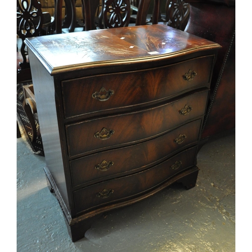 531 - Reproduction mahogany serpentine front chest of four drawers on bracket feet.
(B.P. 21% + VAT)