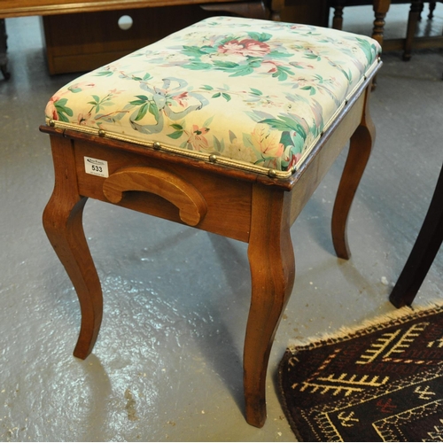 533 - Early 20th Century oak upholstered floral piano stool.
(B.P. 21% + VAT)