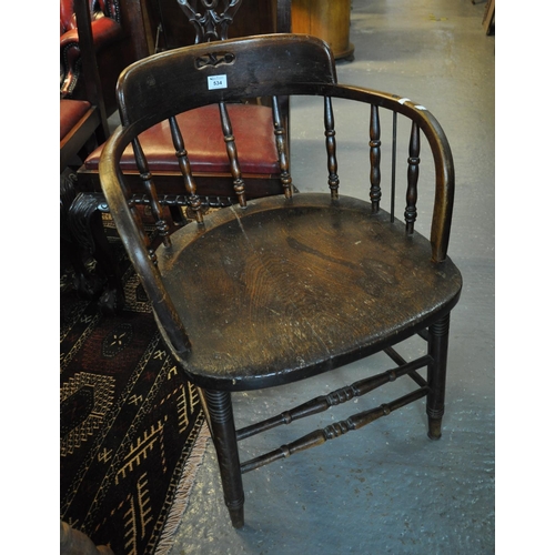 534 - Early 20th Century elm spindle back captain's type/office chair.
(B.P. 21% + VAT)