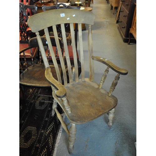 535 - Beech and elm spindle back farmhouse armchair.
(B.P. 21% + VAT)