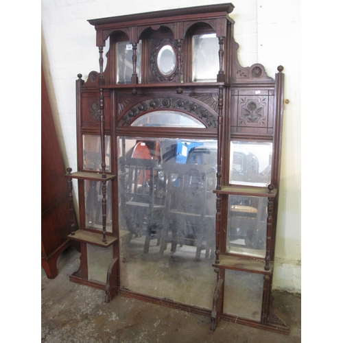 540 - Edwardian heavily carved mirror back over mantel mirror.
(B.P. 21% + VAT)