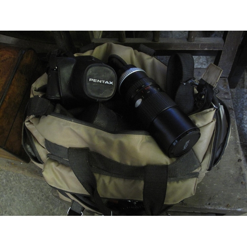 545 - Camera bag containing assorted camera lenses including; Hoya, Pentax etc.
(B.P. 21% + VAT)