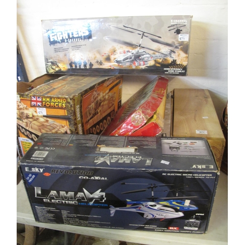 571 - Collection of toys, mainly remote control helicopters, H.M Armed Forces tanks, Tri-ang railways elec... 