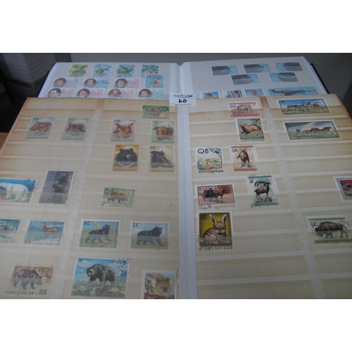 64 - Box with all world selection of stamps in eight albums and stockbooks, 100s of stamps.
(B.P. 21% + V... 