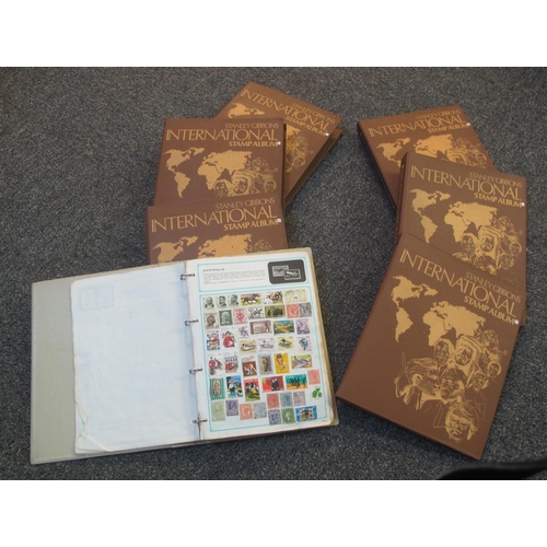 66 - All world stamp collection in six Stanley Gibbons international albums and a Worldex album, many 100... 