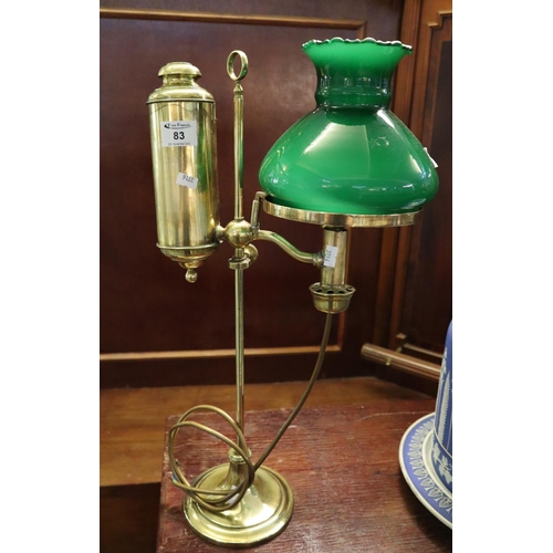 83 - 19th Century brass reading lamp with overlay glass shade ,converted to electricity.
(B.P. 21% + VAT)