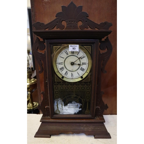 93 - Early 20th Century American gingerbread type two train mantel clock. 56cm high approx.
(B.P. 21% + V... 