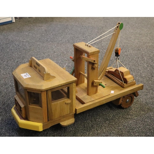 101 - Well made hardwood toy model of a 'Hakin Road Tug' with crane and winch. Made by John C Davies of Ha... 