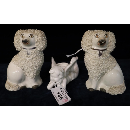 186 - A pair of 19th Century Staffordshire pottery shredded clay poodles, together with a Japanese porcela... 