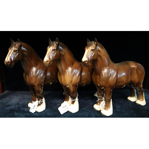 194 - Three Beswick pottery Shire horses.
(B.P. 21% + VAT)