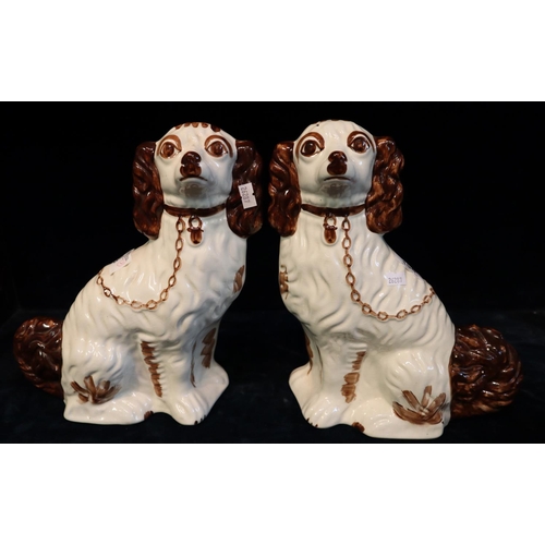 196 - Pair of Staffordshire style pottery fireside spaniels with painted features. Modern.
(B.P. 21% + VAT... 