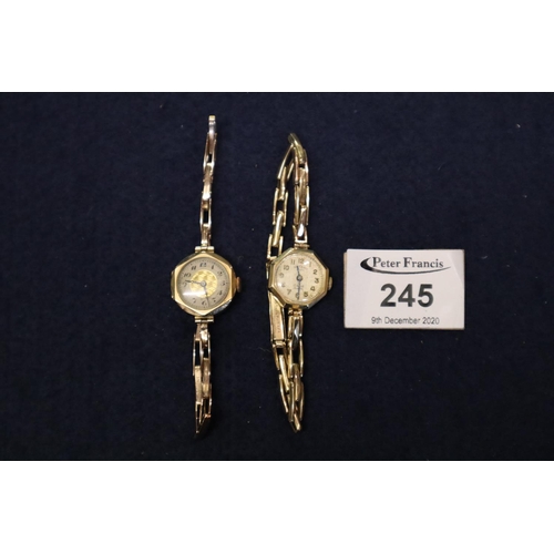 245 - Two ladies octagonal 9ct gold wristwatches, one having 9ct gold expanding bracelet, the other gold p... 