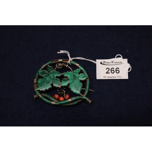 266 - A Victorian silver and malachite brooch.
(B.P. 21% + VAT)