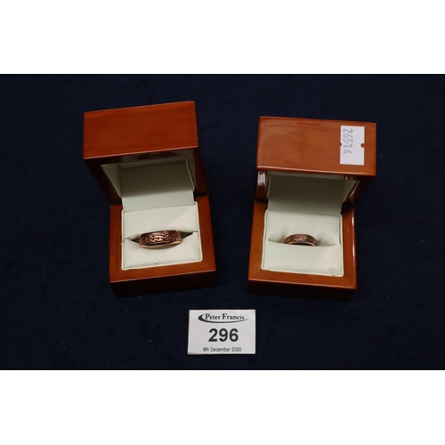 296 - Two Clogau gold wedding rings both 9ct rose gold.  Size L and Z.  Approximate weight 12.4 grams.
(B.... 