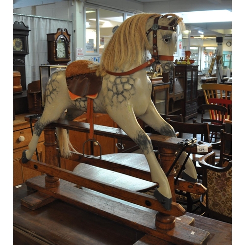 513 - Early 20th Century dapple grey child's rocking horse with saddle and harness, natural mane and tail ... 