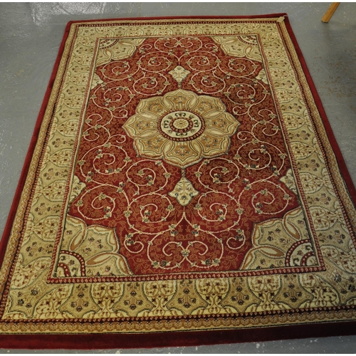 514 - Modern Busan design rug or small carpet on red and cream ground.
(B.P. 21% + VAT)