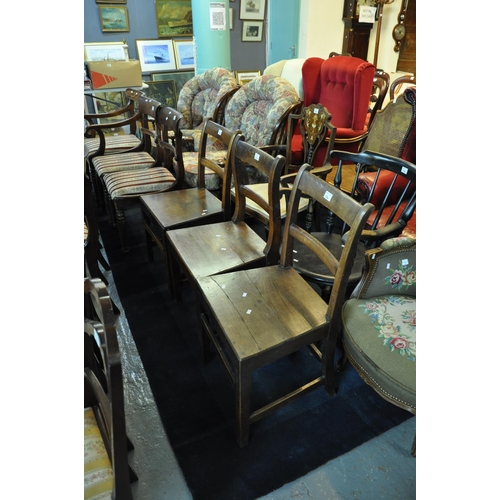 526 - Group of three similar 19th Century Welsh oak bar backed single kitchen chairs with solid seats. (3)... 