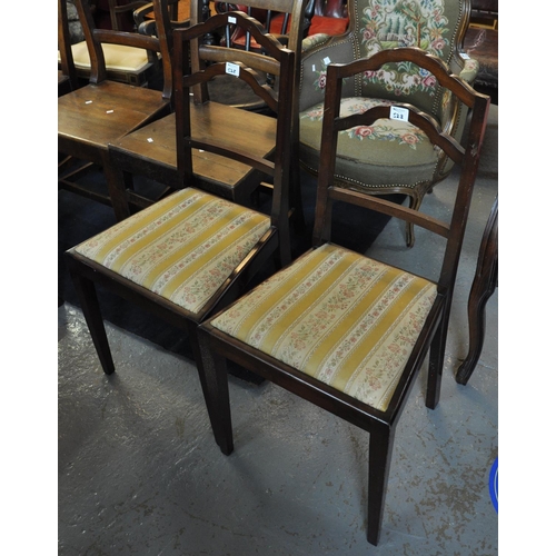 528 - Pair of 20th Century mahogany ladder backed occasional chairs with drop in seats. (2)
(B.P. 21% + VA... 