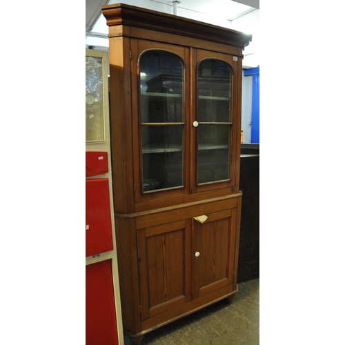 561 - Late Victorian pitch pine two stage corner cabinet.
(B.P. 21% + VAT)